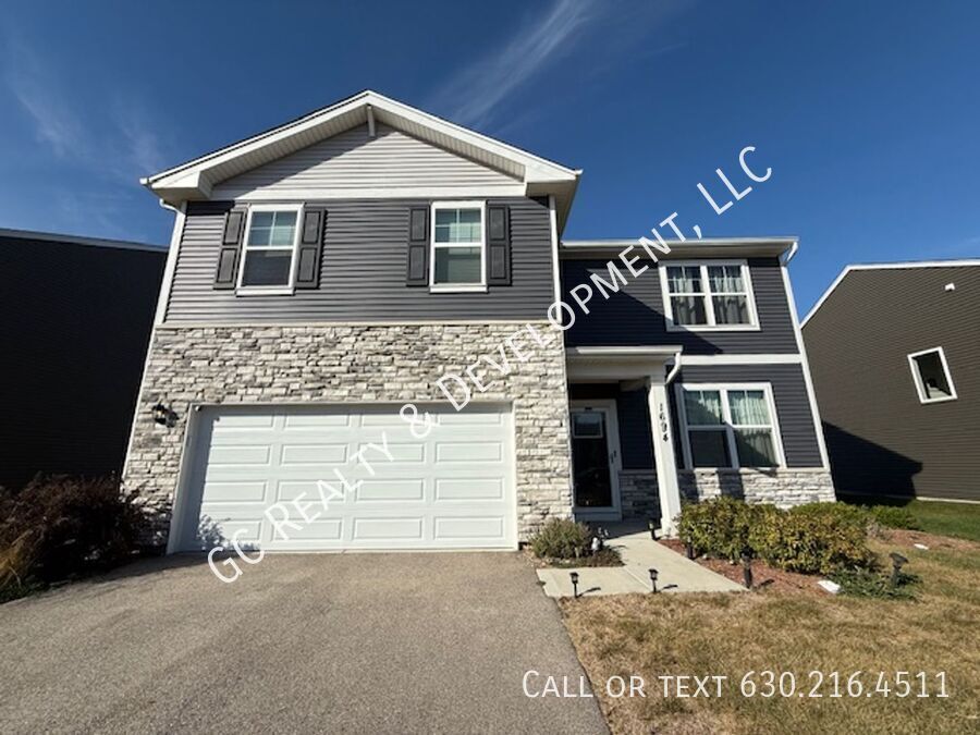 *** NEWER CONSTRUCTION / 4 BDRM - 2.5 BTH / FENCED YARD / IN UNIT LAUNDRY / SOLAR PANELS & TESLA CHARGER *** property image