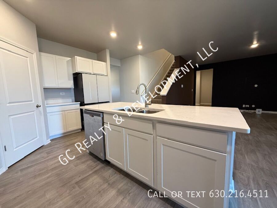 *** NEWER CONSTRUCTION / 4 BDRM - 2.5 BTH / FENCED YARD / IN UNIT LAUNDRY / SOLAR PANELS & TESLA CHARGER *** property image