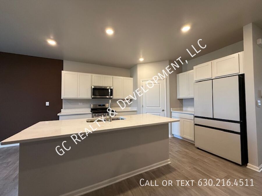 *** NEWER CONSTRUCTION / 4 BDRM - 2.5 BTH / FENCED YARD / IN UNIT LAUNDRY / SOLAR PANELS & TESLA CHARGER *** property image