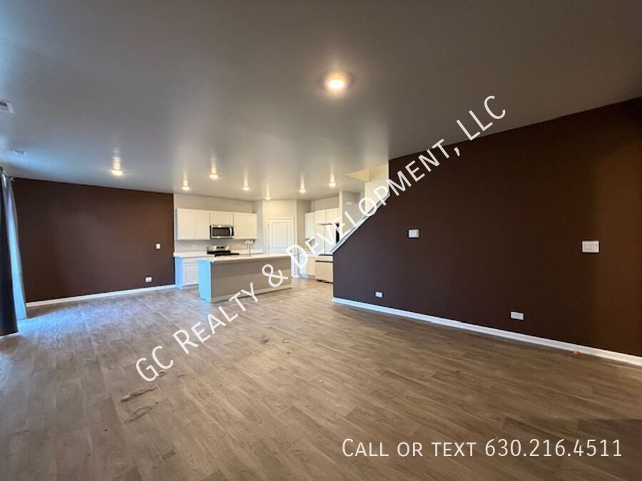 *** NEWER CONSTRUCTION / 4 BDRM - 2.5 BTH / FENCED YARD / IN UNIT LAUNDRY / SOLAR PANELS & TESLA CHARGER *** property image