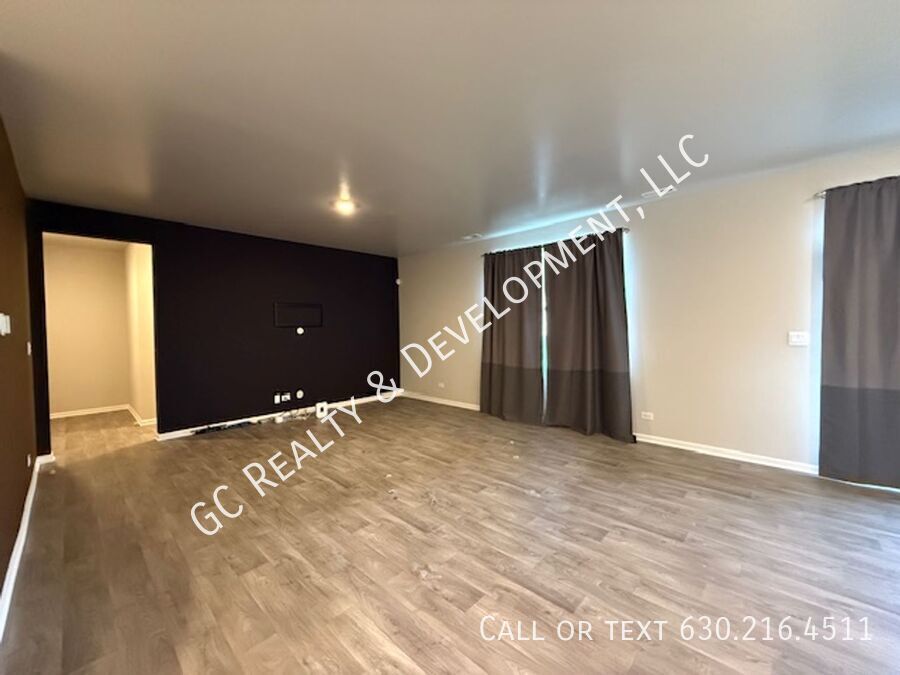 *** NEWER CONSTRUCTION / 4 BDRM - 2.5 BTH / FENCED YARD / IN UNIT LAUNDRY / SOLAR PANELS & TESLA CHARGER *** property image