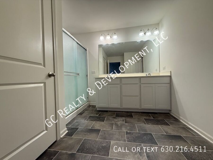 *** NEWER CONSTRUCTION / 4 BDRM - 2.5 BTH / FENCED YARD / IN UNIT LAUNDRY / SOLAR PANELS & TESLA CHARGER *** property image