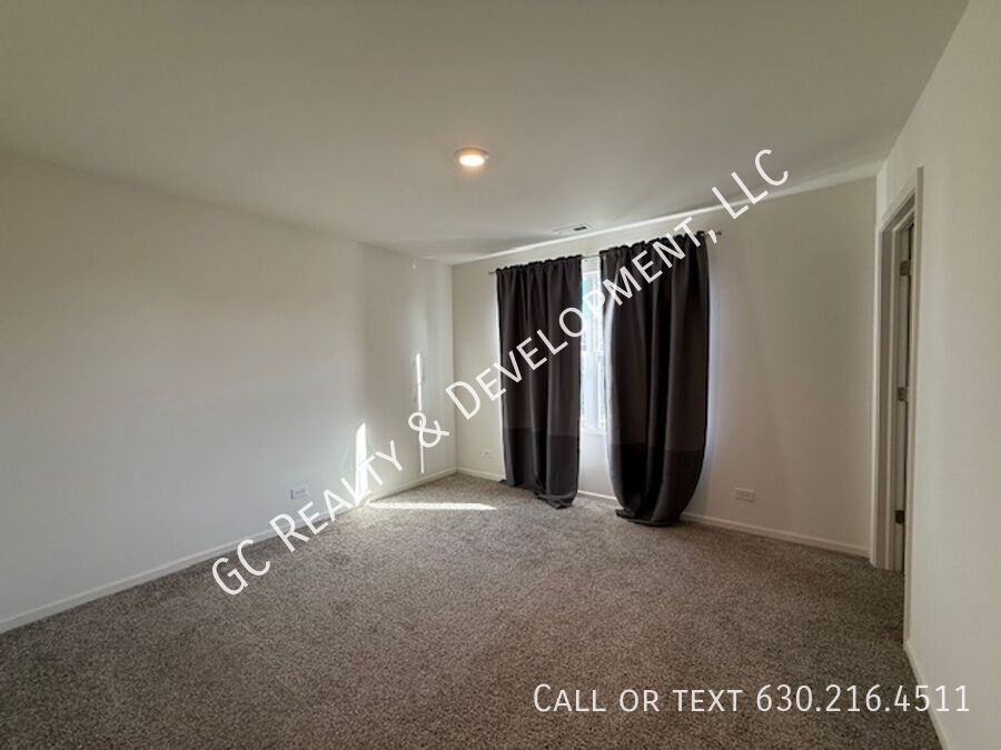 *** NEWER CONSTRUCTION / 4 BDRM - 2.5 BTH / FENCED YARD / IN UNIT LAUNDRY / SOLAR PANELS & TESLA CHARGER *** property image