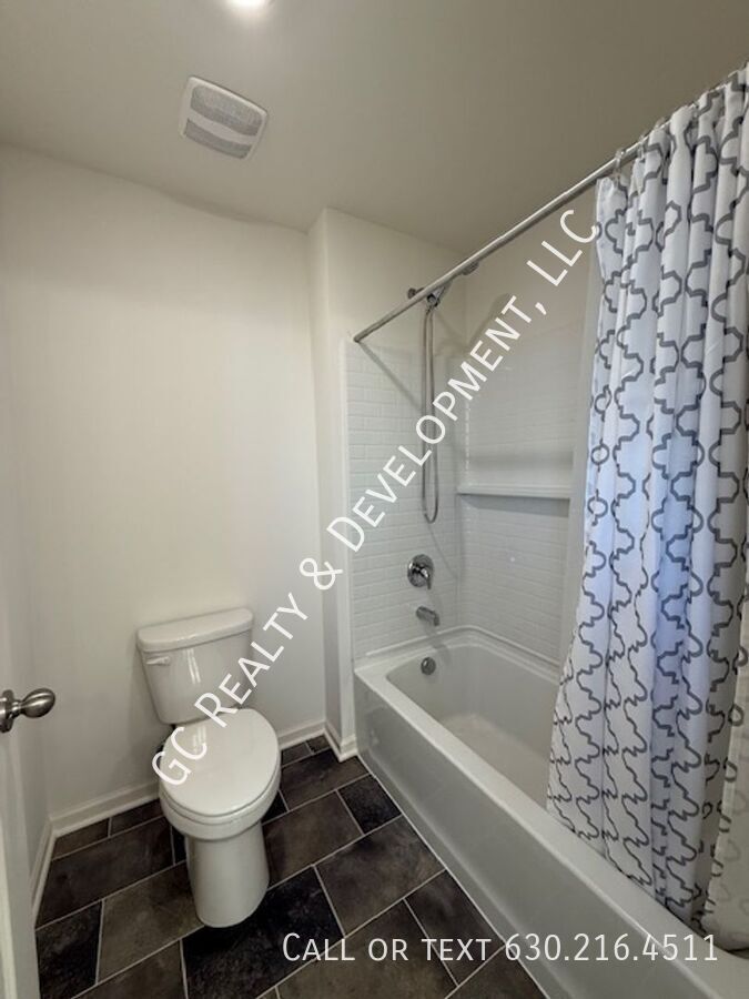*** NEWER CONSTRUCTION / 4 BDRM - 2.5 BTH / FENCED YARD / IN UNIT LAUNDRY / SOLAR PANELS & TESLA CHARGER *** property image