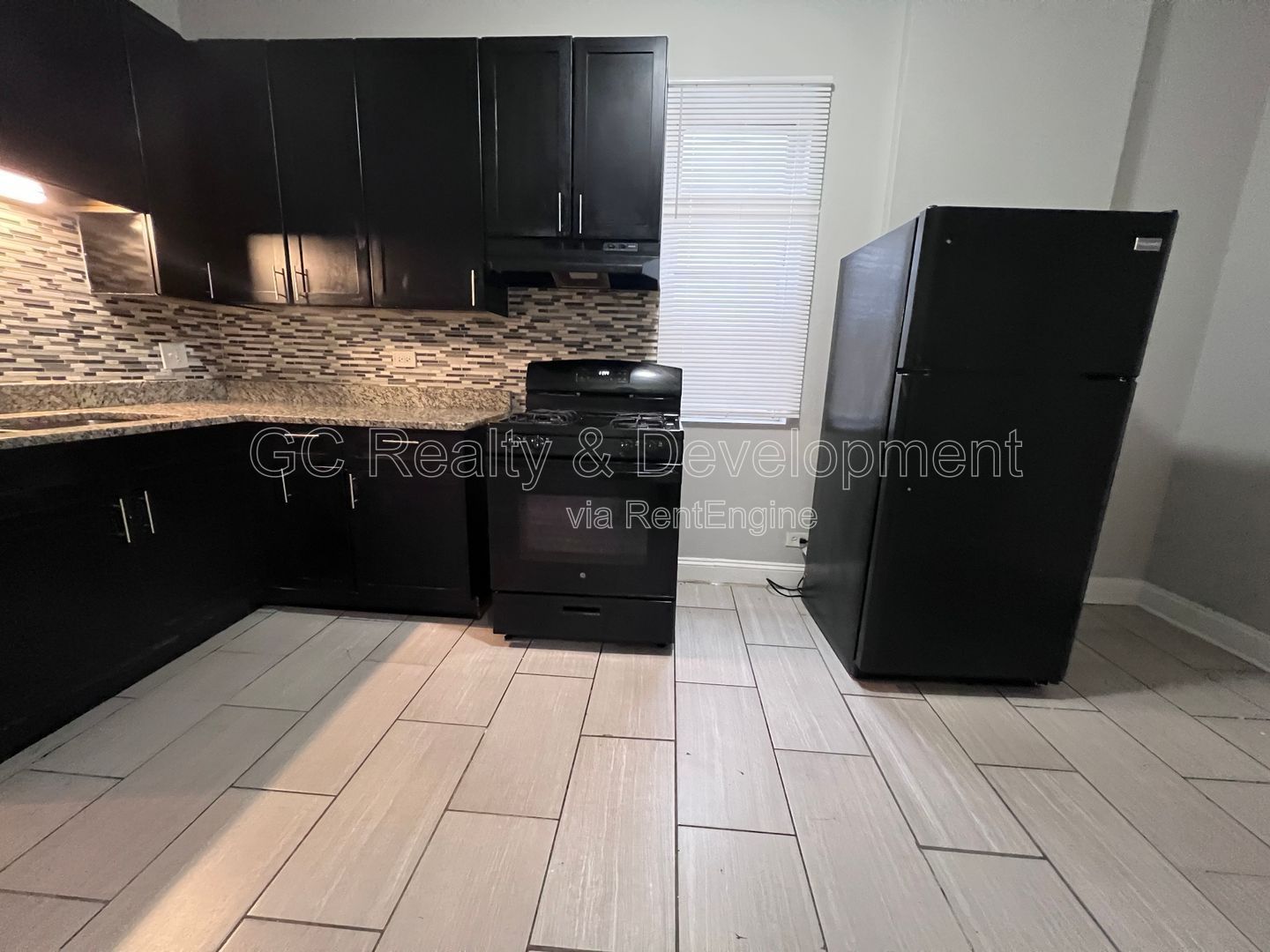 *** FRESH PAINT / 4 BDRM / RECENTLY UPDATED / APPLIANCES INCL / HARDWOOD FLOORS *** property image