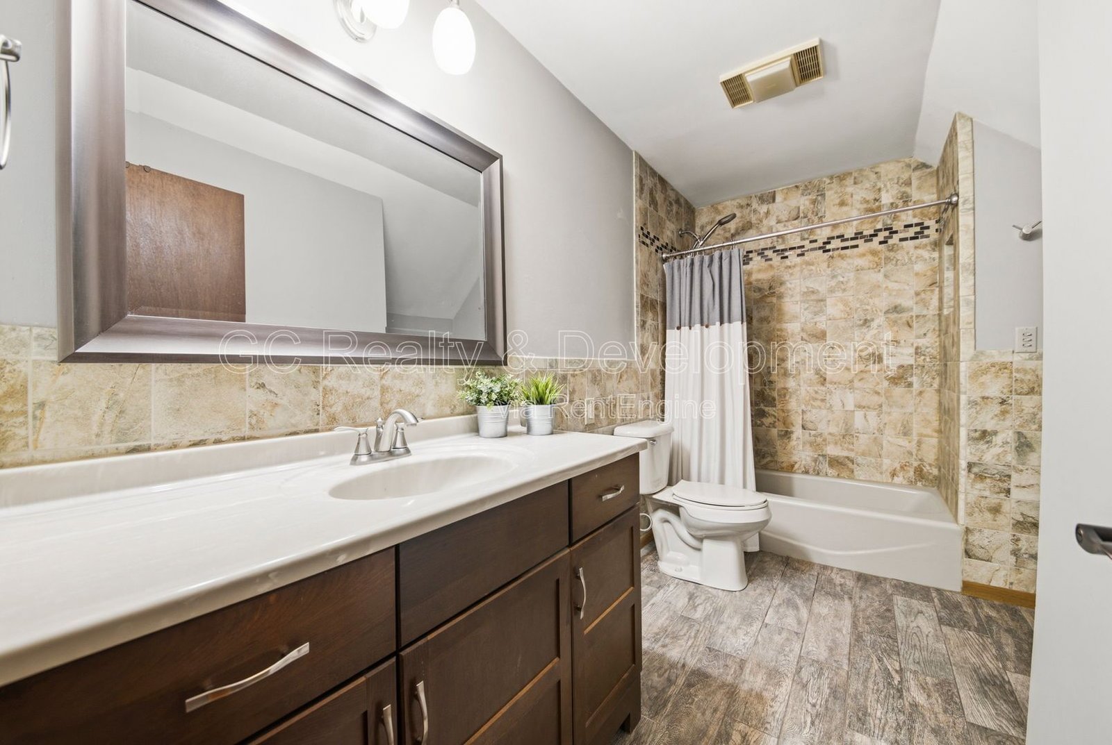 *** 4BR - 2BA / SS APPLIANCES / HARDWOOD FLOORS / CENTRAL AIR / IN-UNIT LAUNDRY / GARAGE / FENCED LOT / AMPLE STORAGE *** property image