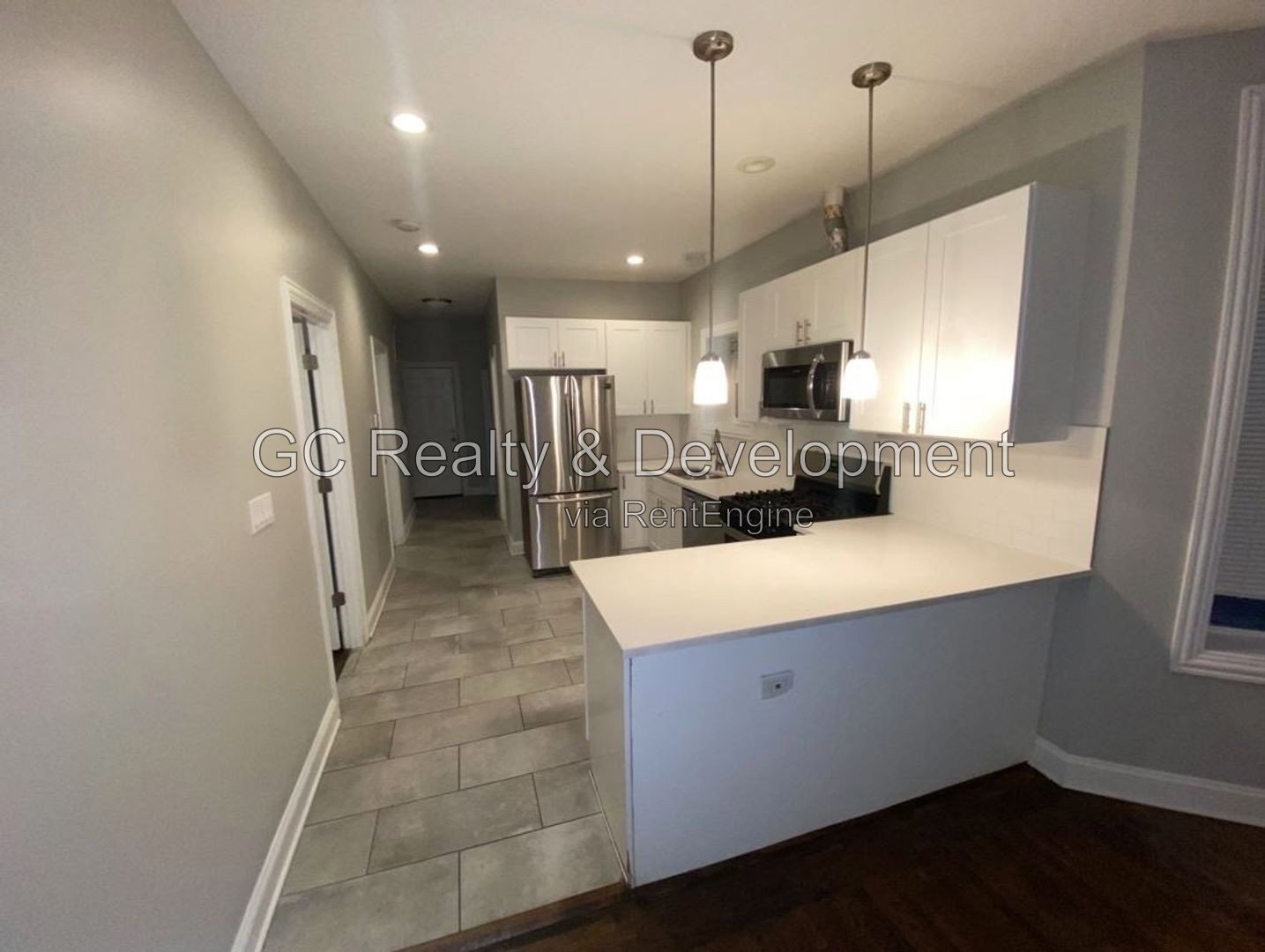 *** LOGAN SQUARE / 4BR-2BR DUPLEX DOWN / SS APPLIANCES / CENTRAL AIR / IN-UNIT LAUNDRY / PET FRIENDLY / HARDWOOD FLOORS / FINISHED BASEMENT *** property image