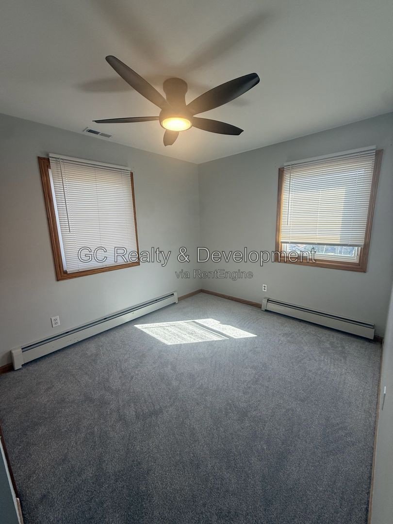 *** 4BR - 2.5BA / CENTRAL AIR / IN-UNIT LAUNDRY / SS APPLIANCES / GARAGE / PET FRIENDLY / FENCED YARD / HARDWOOD FLOORS / FINISHED BASEMENT *** property image
